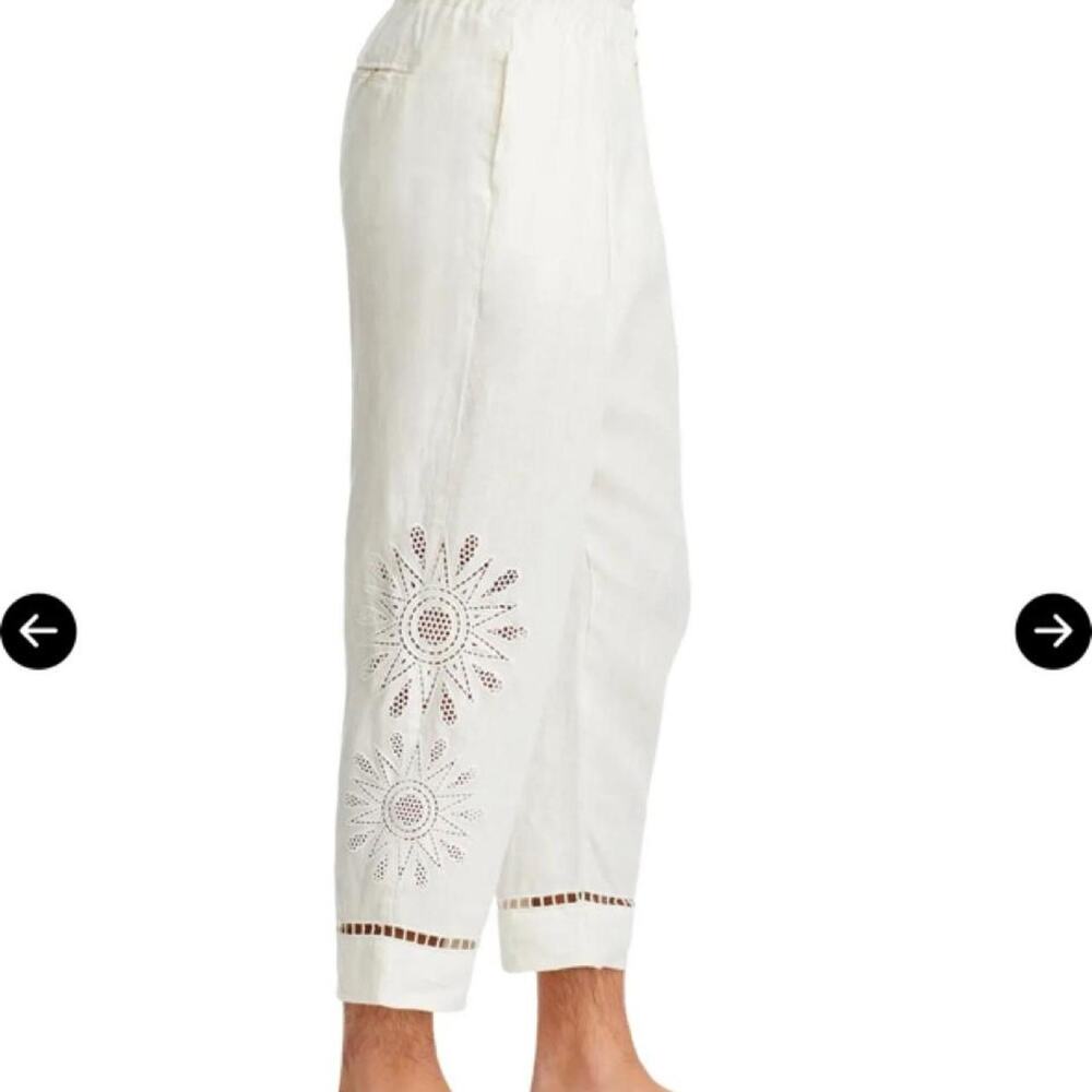 White linen pants with embroidered